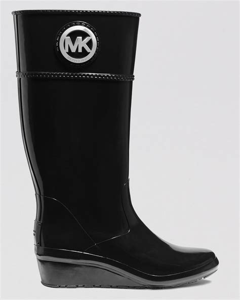 michael kors wedge rain boots black|Michael Kors waterproof boots.